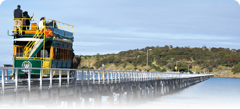 Horse-drawn tram crossing the causeway to Granite Island